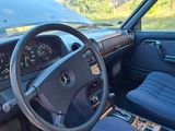 a car dashboard with a steering wheel and a dash board