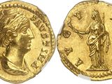 a gold coin with an image of a woman holding a sword