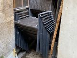 a chair that is sitting in the corner of a building