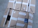 several cardboard boxes are stacked on top of each other on the floor