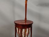 an image of a table with a lamp on top of it