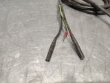 a couple of wires that are on top of a table