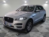 the new jaguar pace suv is parked in the showroom