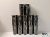 a stack of black cans sitting on top of a table