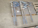several pieces of wood that are sitting on a pallet