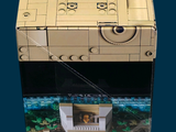 a box that has a model of a star destroyer on top of it