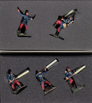 six figurines of a man on a snowboard in a box
