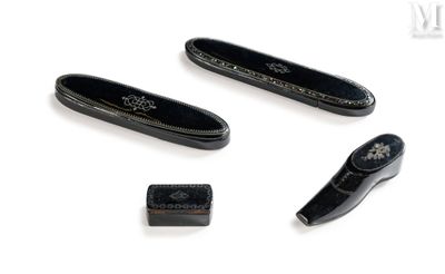 four different types of black leather items on a white surface