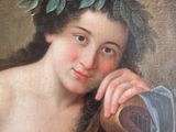 une peinture à l'huile représentant une femme coiffée d'une couronne de laurier