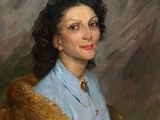 portrait of a woman in a blue dress with a fur coat