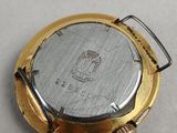 an image of a close up of a watch on a table