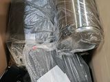 a box full of items that are wrapped up and ready to be shipped