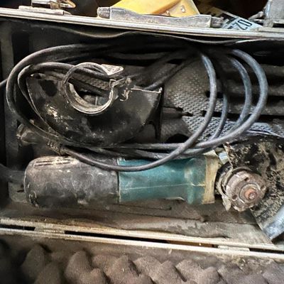 a pile of old tools sitting on top of a table