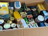 a box full of food that is sitting on the floor