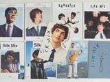 a picture of a collage of pictures of a man in a suit and tie