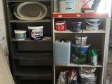 an image of a room with a shelf and a microwave