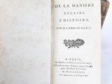 an open book with a picture of a rooster on it
