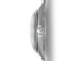 a close up of a wrist watch on a white surface