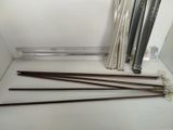 four wooden sticks sitting next to each other on a table