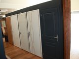 a room that has a bunch of closets in it