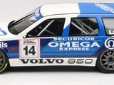 a blue and white car that is on a white surface