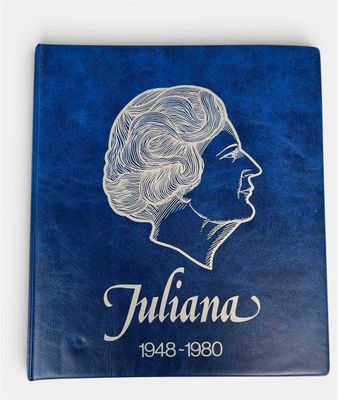 a blue book with a drawing of a woman ' s profile on it