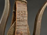 a close up of a pair of scissors with numbers on them