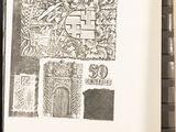 a black and white drawing of a building on a table