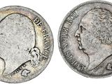 une pièce d'argent portant une tête d'homme