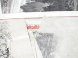 a picture of a bunch of drawings on a table