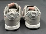 a close up of a pair of shoes that are on a table