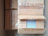 a cardboard box with several boxes stacked on top of it