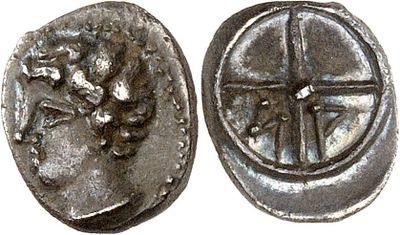 a close up of a coin with a lion on it