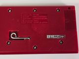 an image of a close up of a red electronic device