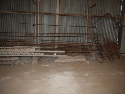 a room that has a bunch of metal bars on the floor