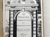 an old book with a black and white drawing of a doorway