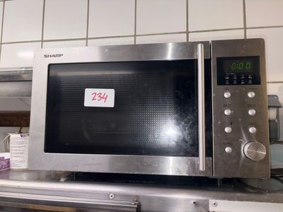 a microwave that is sitting on top of a counter