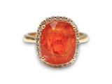 une bague sertie d'une opale de feu orange et de diamants