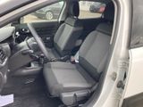 a car that has two seats in the back of it