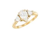 a yellow gold ring with three pear shaped diamonds