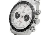rolex watch with white dial and black bezeled bezel