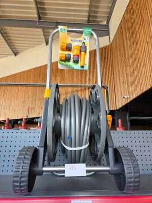 an image of a garden hose cart in a store