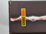 a box of cigarettes with a red stripe on it