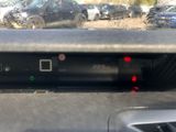 a car dashboard with a car ' s engine light on