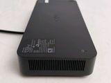 a small black device sitting on top of a table