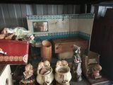 many figurines that are sitting on a table