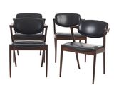 lot de quatre chaises de salle à manger en cuir noir