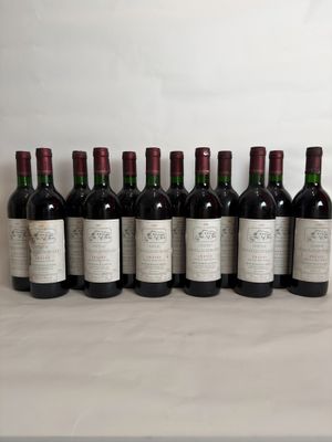 six bottles of wine are lined up on a table