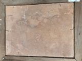 a picture of a wooden box with a tag on it