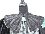 a mannequin with a black and white dress on it